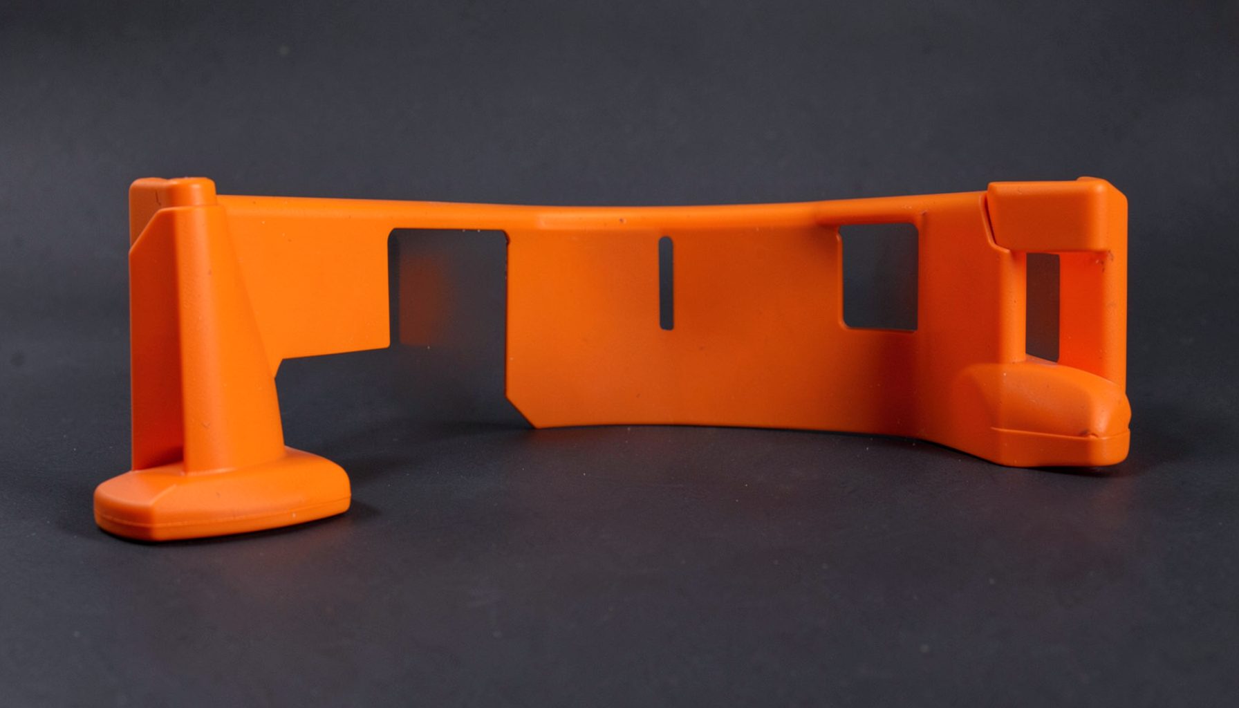 Amber and orange firewall-style barrier graphic on a dark slate surface
